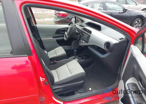 2012 Toyota Prius C from USA, damaged, VIN JTDKDTB33C1527017